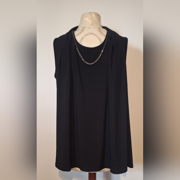 Frank Lyman Design Tops - Frank Lyman Design Black Sleeveless Top with Black Metal Chain Accent.